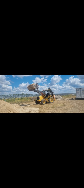 USŁUGI KOPARKO-ŁADOWARKĄ