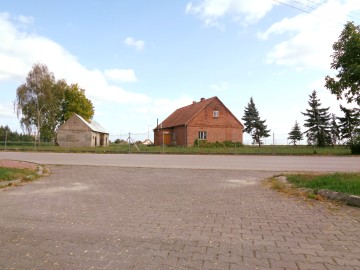 Gmina Ślesin – Dom w sąsiedztwie jeziora