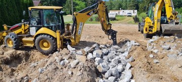 Usługi: Koparko-Ładowarką Minikoparką Koparką obrotową  Tran