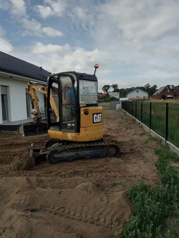 Usługi: Koparko-Ładowarką Minikoparką Koparką obrotową  Tran