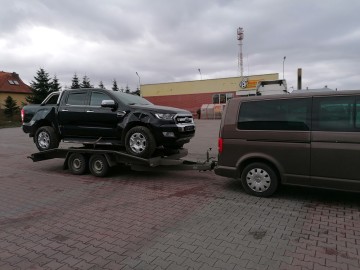 Przew&oacute;z os&oacute;b - Laweta