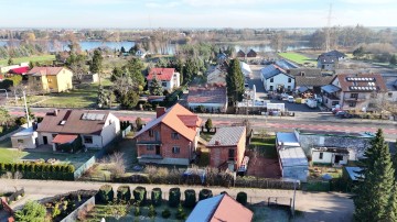 Dom w budowie z budynkiem komercyjnym - Mikorzyn