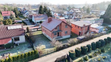 Dom w budowie z budynkiem komercyjnym - Mikorzyn