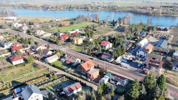 Dom w budowie z budynkiem komercyjnym - Mikorzyn