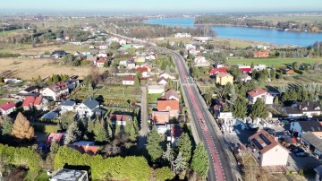 Dom w budowie z budynkiem komercyjnym - Mikorzyn