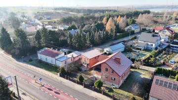 Dom w budowie z budynkiem komercyjnym - Mikorzyn