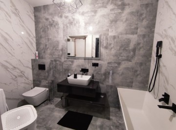 Apartament z tarasem, działką i miejscem parkingowym -Konin