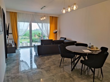 Apartament z tarasem, działką i miejscem parkingowym -Konin