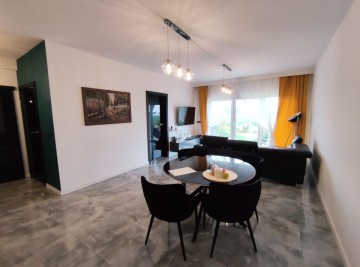 Apartament z tarasem, działką i miejscem parkingowym -Konin