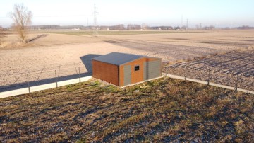 Sprzedam działkę budowlaną ogrodzoną z garażem -Dobrosołowo