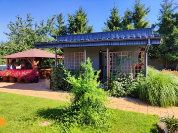 Sprzedam działkę ROD z pięknym ogrodem i domkiem po remoncie