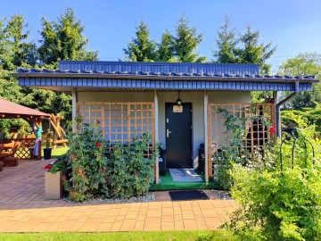 Sprzedam działkę ROD z pięknym ogrodem i domkiem po remoncie