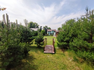 Na sprzedaż dom w pobliżu jezior, zagospodarowana działka