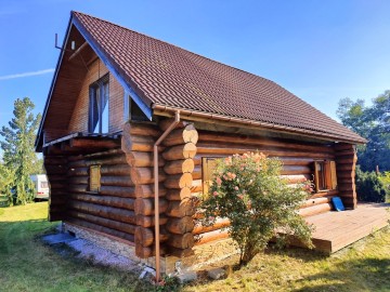 Sprzedam dom z bali na dużej działce w okolicy jeziora