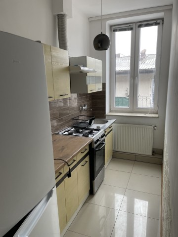 1-pokojowe mieszkanie z oddzielną kuchnią i łazienką