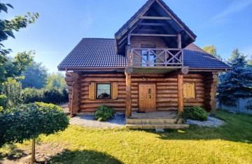 Sprzedam dom z bali na dużej działce w okolicy jeziora