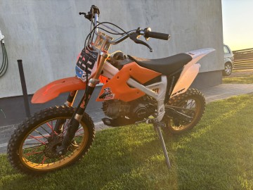 Cross KXD 125 cc + kask