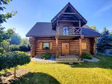 Sprzedam dom z bali na dużej działce w okolicy jeziora