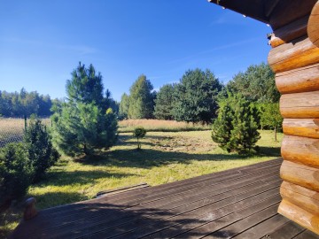 Sprzedam dom z bali na dużej działce w okolicy jeziora