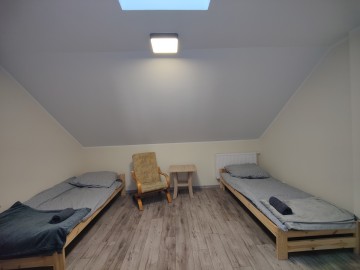 Budynek handlowo-usługowy ze sklepem i pokojami noclegowymi