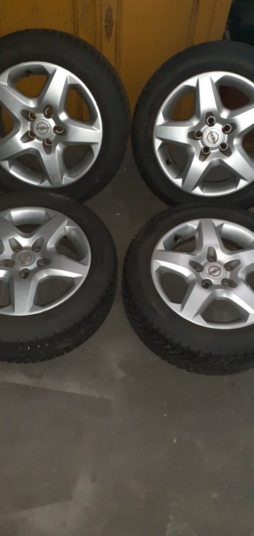 Koła ,opona z felgą i kołpakiem do opla 16" 205/55