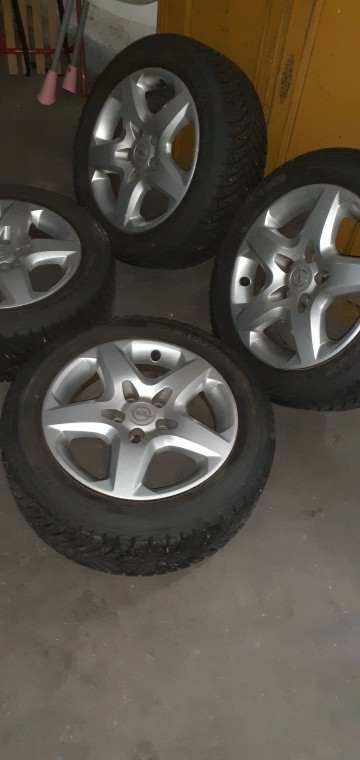 Koła ,opona z felgą i kołpakiem do opla 16" 205/55