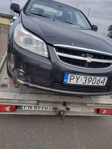 Pomoc drogowa 24h/7 Transport lawetą/